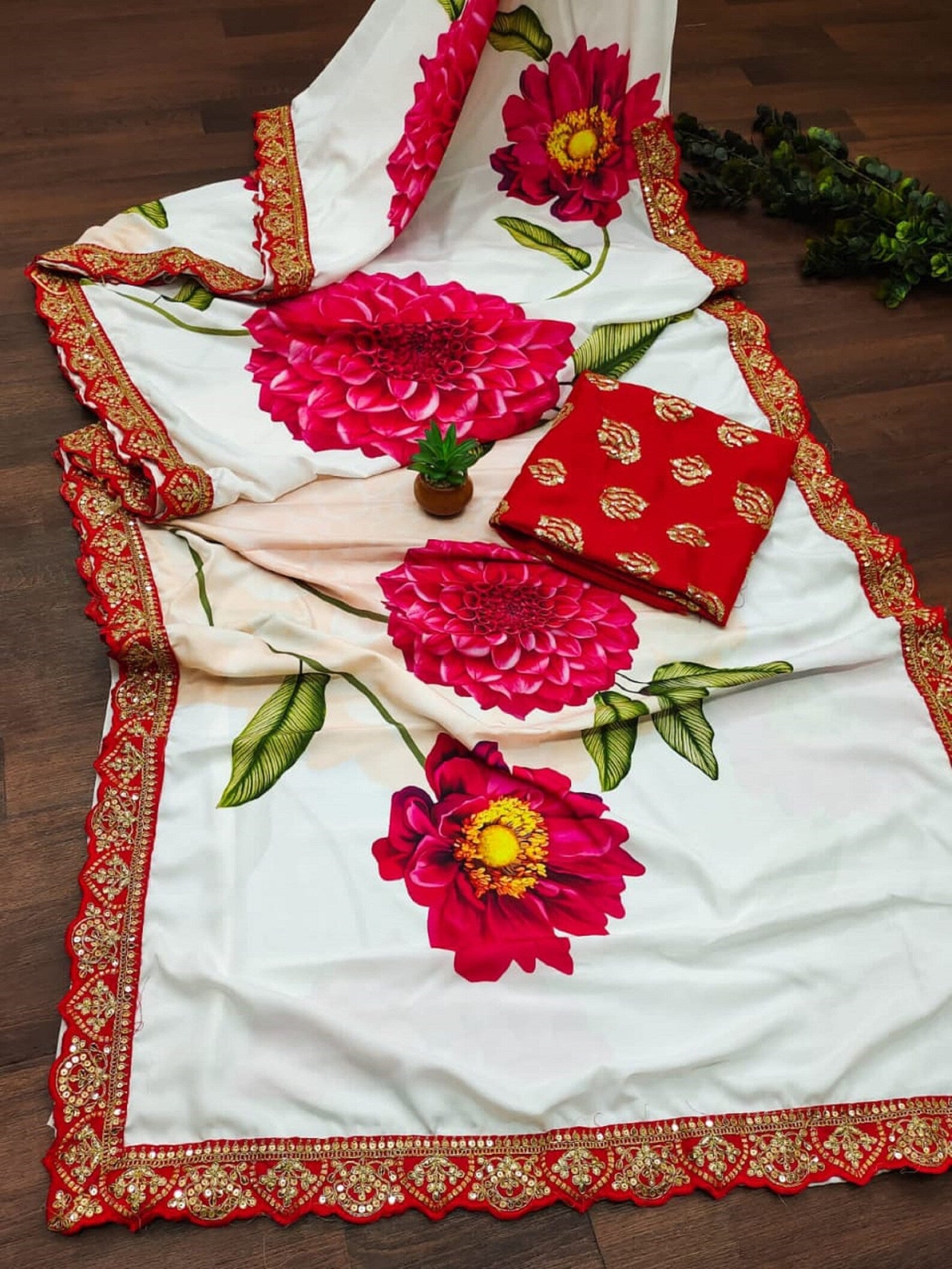 Floral print embroidered border saree with stitched blouse