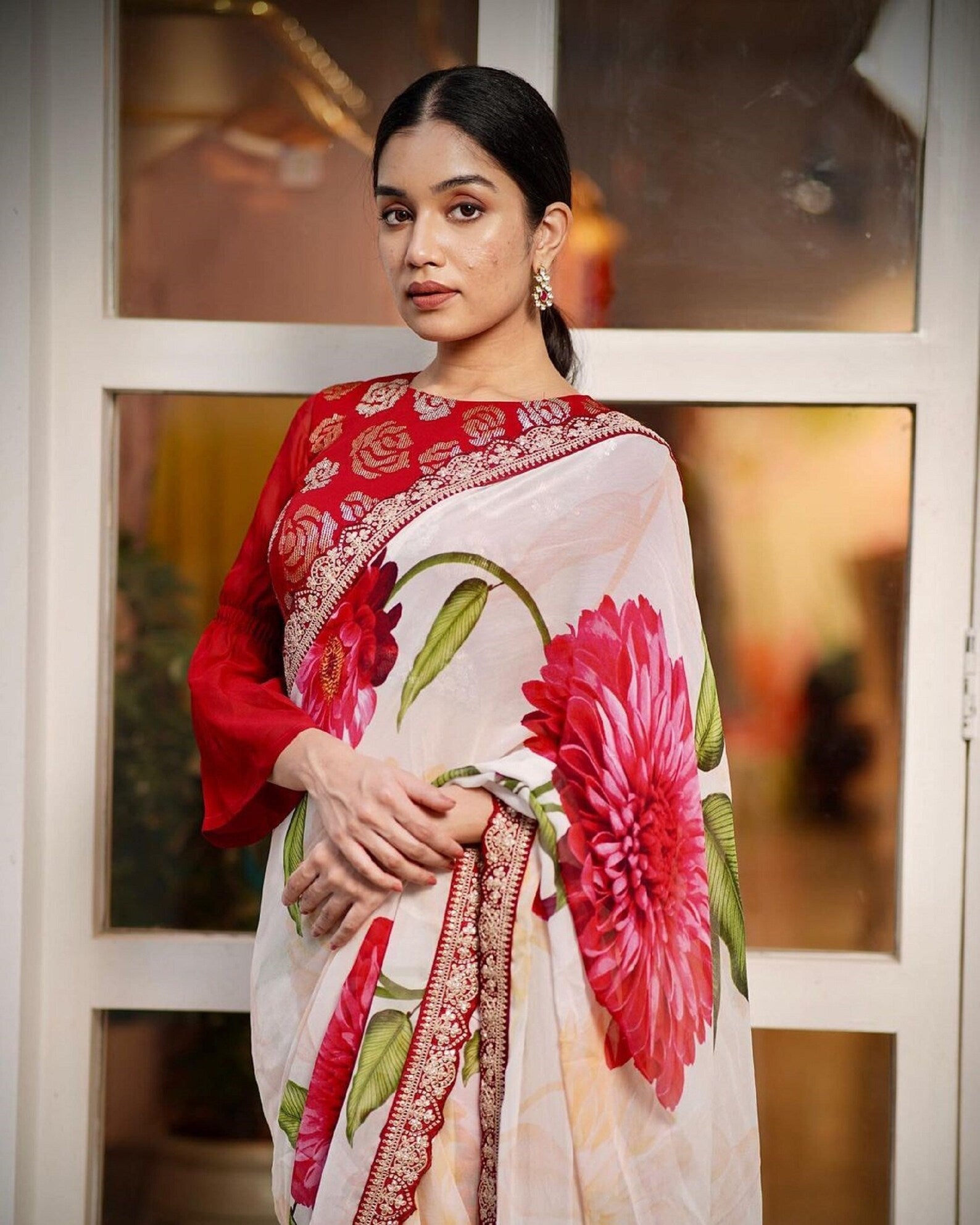 Floral print embroidered border saree with stitched blouse